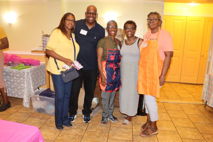 Majorie Fisher, a Jamaican-born member of the committee that oversees the United Methodist Church’s Parish Development Grant, second from right, with Marlene Ferguson, center, Minerva Beaton, right, and Pastor Roger Jackson and First Lady Kim Jackson, left