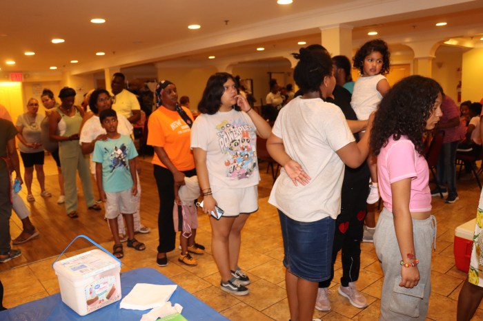 Homeless families queue up for ice cream and cake