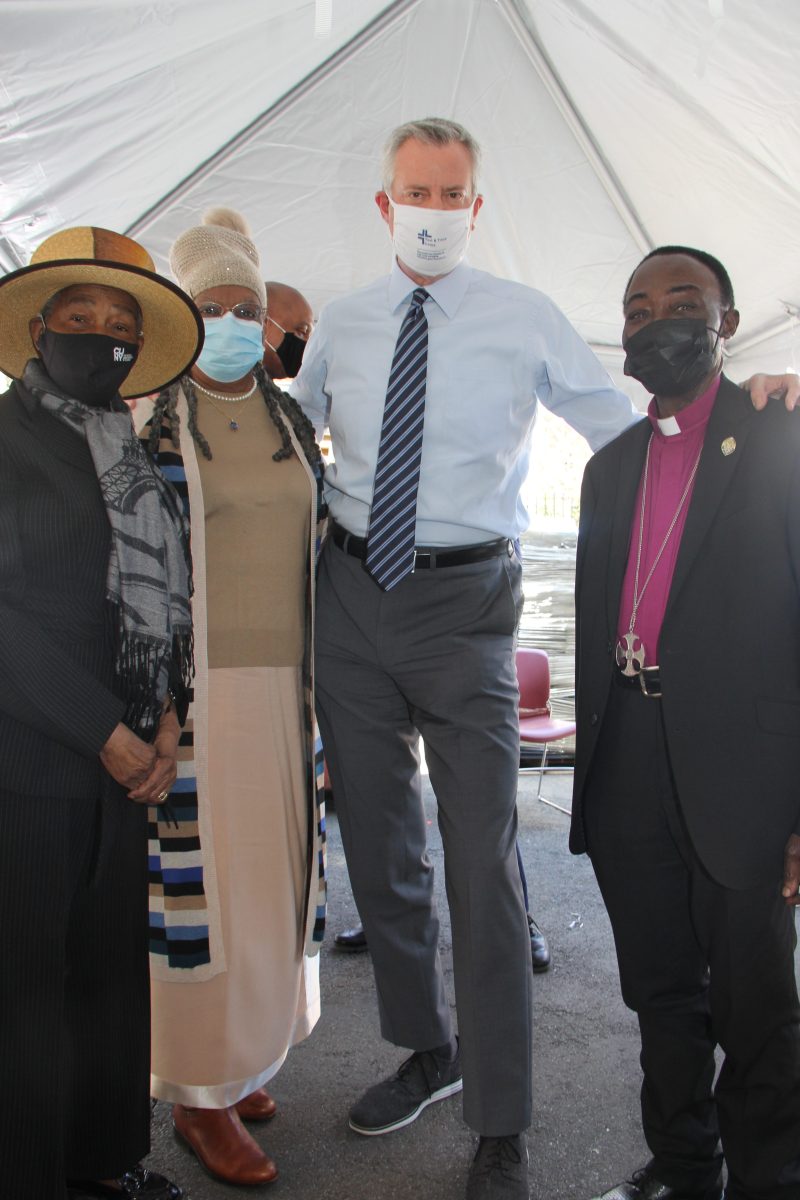 New York City Mayor Bill de Blasio flanked by, L-R: Former New York City Council Member Jamaican Dr. Una S.T. Clarke; Jamaican Bishop Sylveta Hamilton Gonzales, founder and pastor of Q Kingdom Ministries in Brooklyn; and the Rt. Rev. Daniel Allotey, Assisting Bishop, Diocese of Long Island, and Bishop in Residence at St. Gabriel's Episcopal Church on Hawthorne Street in Brooklyn.