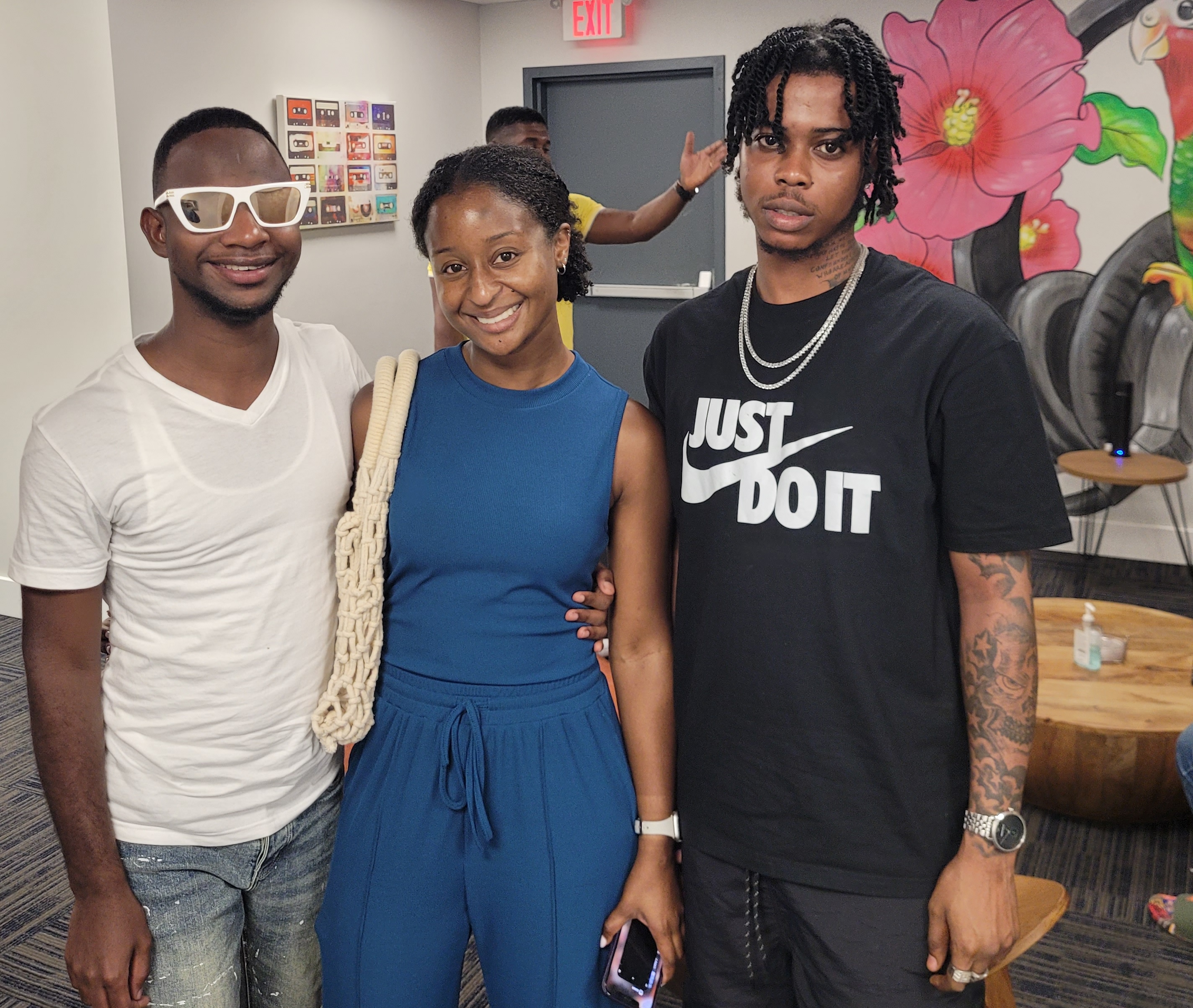 Singer Nigy Boy, Christina Anderson (fan) and Nhance share lens time backstage at Rumpy Weekend in Cayman Islands