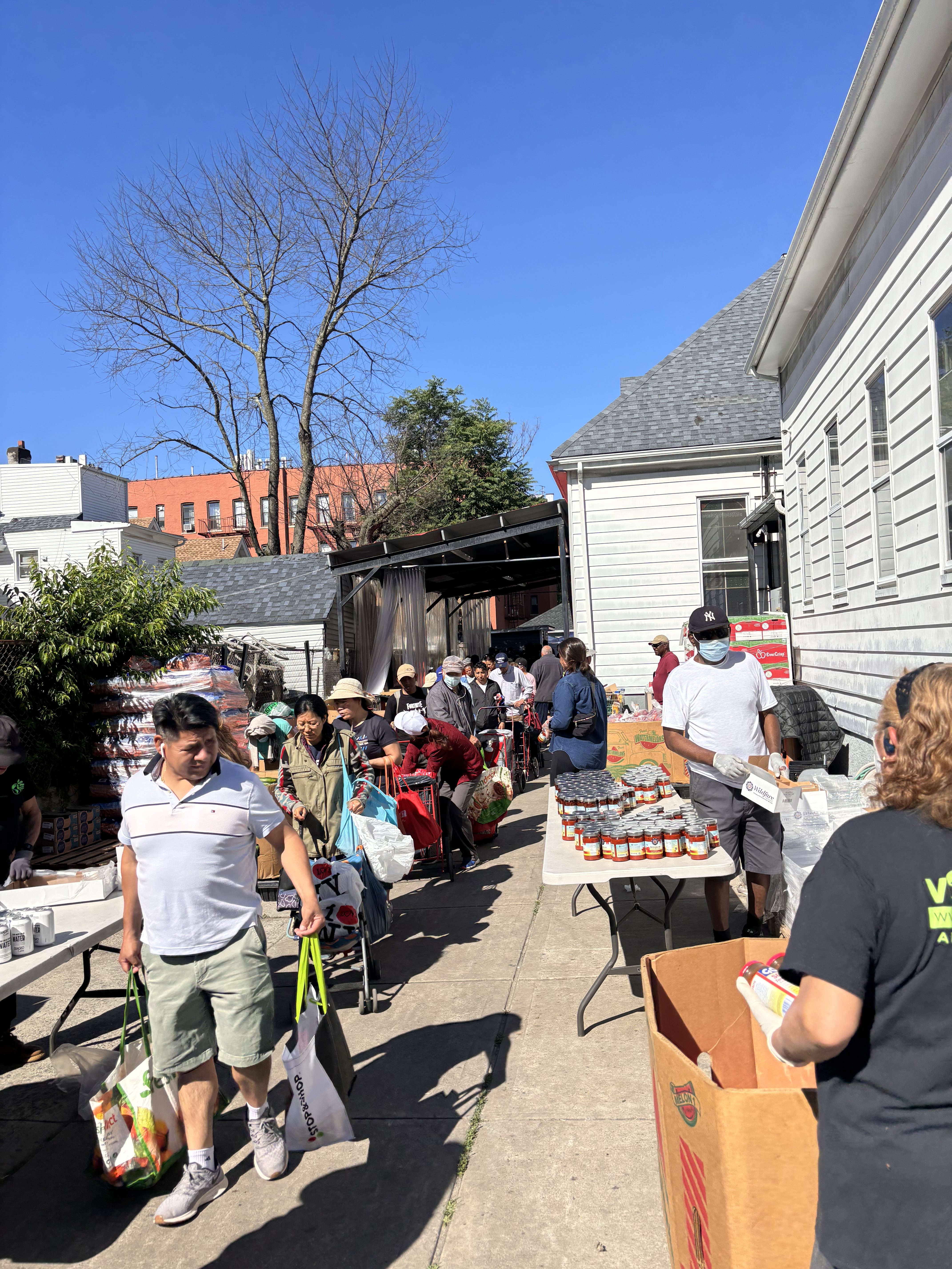 Community members receiving groceries from Calvary's Mission