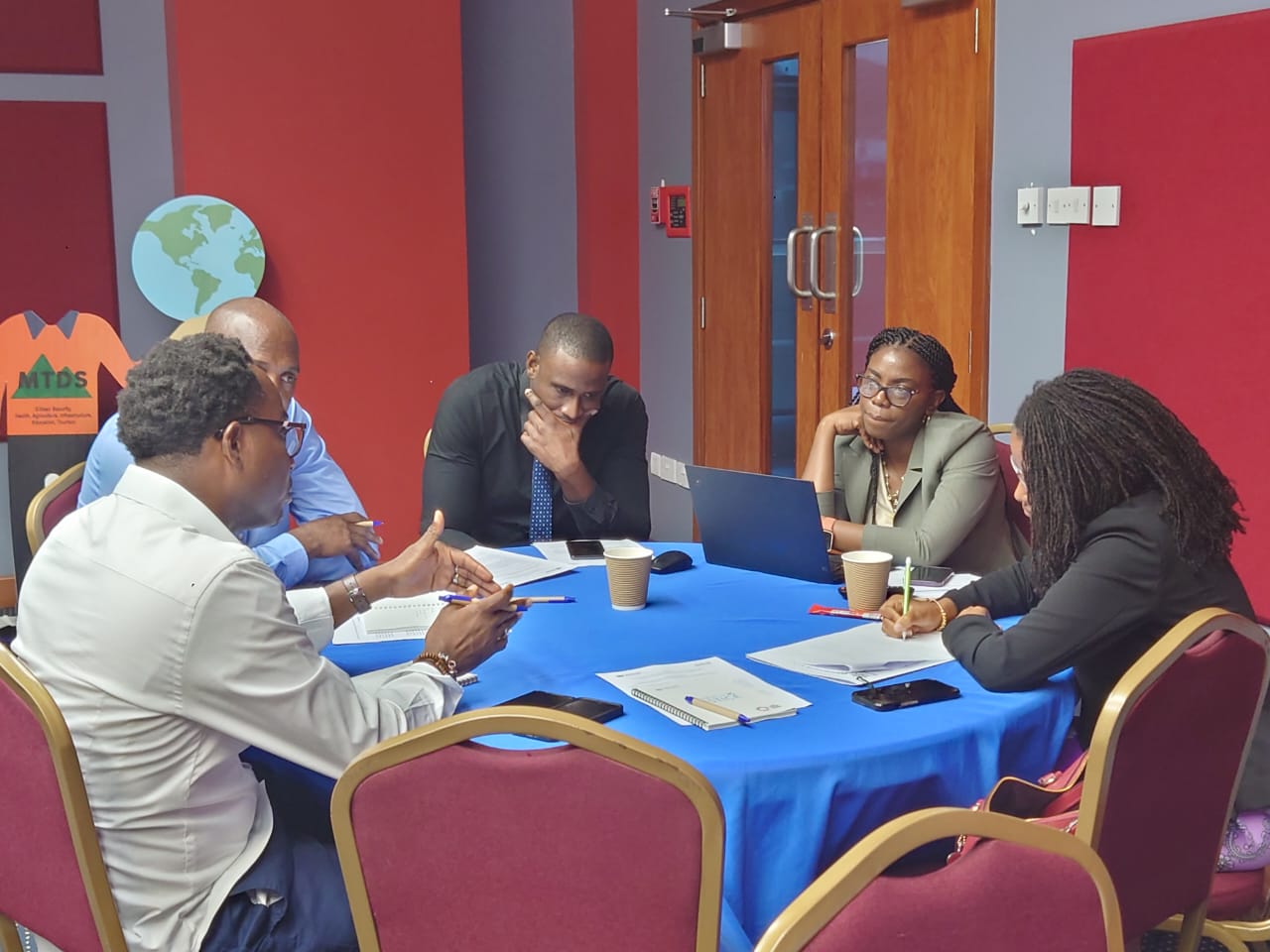 Workshop participants engaged in group activity