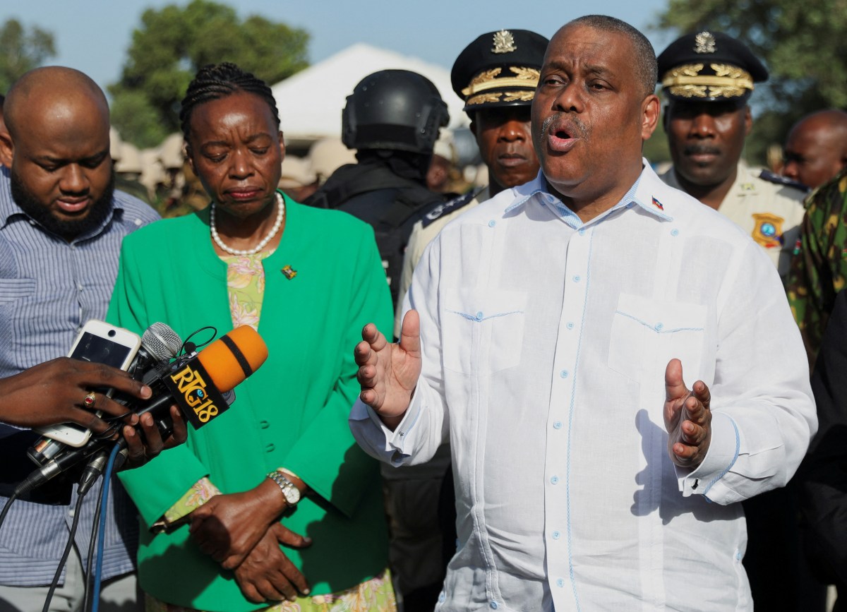 Haiti's Prime Minister Garry Conille and Kenyan National Security Advisor Monica Juma brief media after members of the first contingent of Kenyan police arrived in the Caribbean country as part of a peacekeeping mission, in Port-au-Prince, Haiti June 26, 2024.