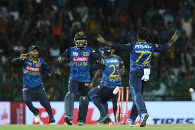 Charith Asalanka of Sri Lanka & Kusal Mendis of Sri Lanka celebrate the wicket of Arshdeep Singh of India during the second one-day international ODI cricket match between India and Sri Lanka at the R. Premadasa International Cricket Stadium in Colombo, Sri Lanka on August 4, 2024