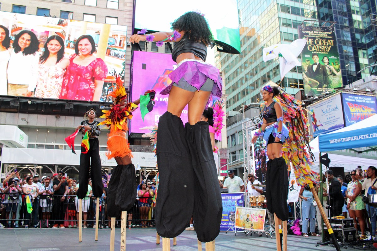 Tropicalfete Moko-junbies put on a spectacular performance at the non-profit's third Pop-Up Caribbean Carnival in Times Square on Aug. 25.