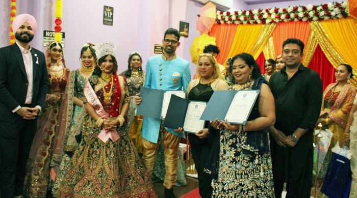 Japneet Singh, far left, wearing a turban, presented Citations from the Office of Public Advocate Jumaane Williams. Pictured are former Miss USA-Guyana 2024 Sebena Sankar, honorees Neeranjan Liliah, owner of Secrets Lounge, Nancy Chandarjeet, and Eugenia Ram, owner of Desi Look, next to Pakistani Ambassador Saghir Khan, with models in the background.