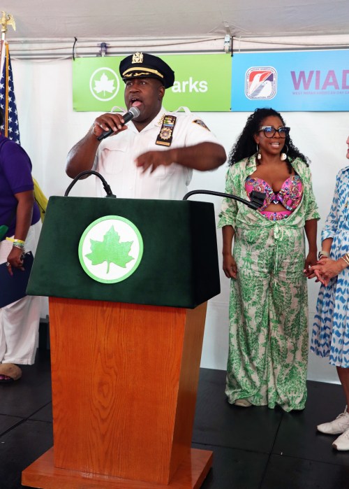 NYPD Chief of Department Jeffrey Maddrey addresses the ceremony with WIADCA Consultant Ann-marie Abramson in the background.