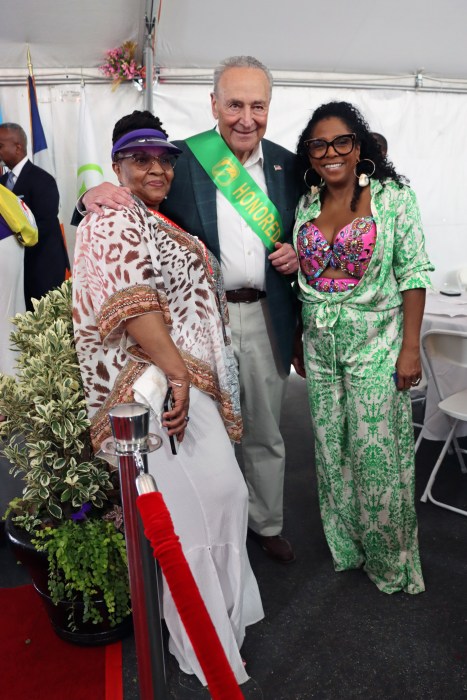 Senate Majority Leader Chuck Schumer with Ann-Marie Abramson, right, and Bishop Sulanch Lewis of Little Rock International Ministry on Nostrand Avenue in Brooklyn.