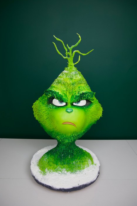 This Grinch-inspired cake was crafted for a corporate Christmas party.