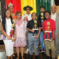 Awardees with Cecily Mason, second from left, and Consul General Raphael M. Brizan, back right.