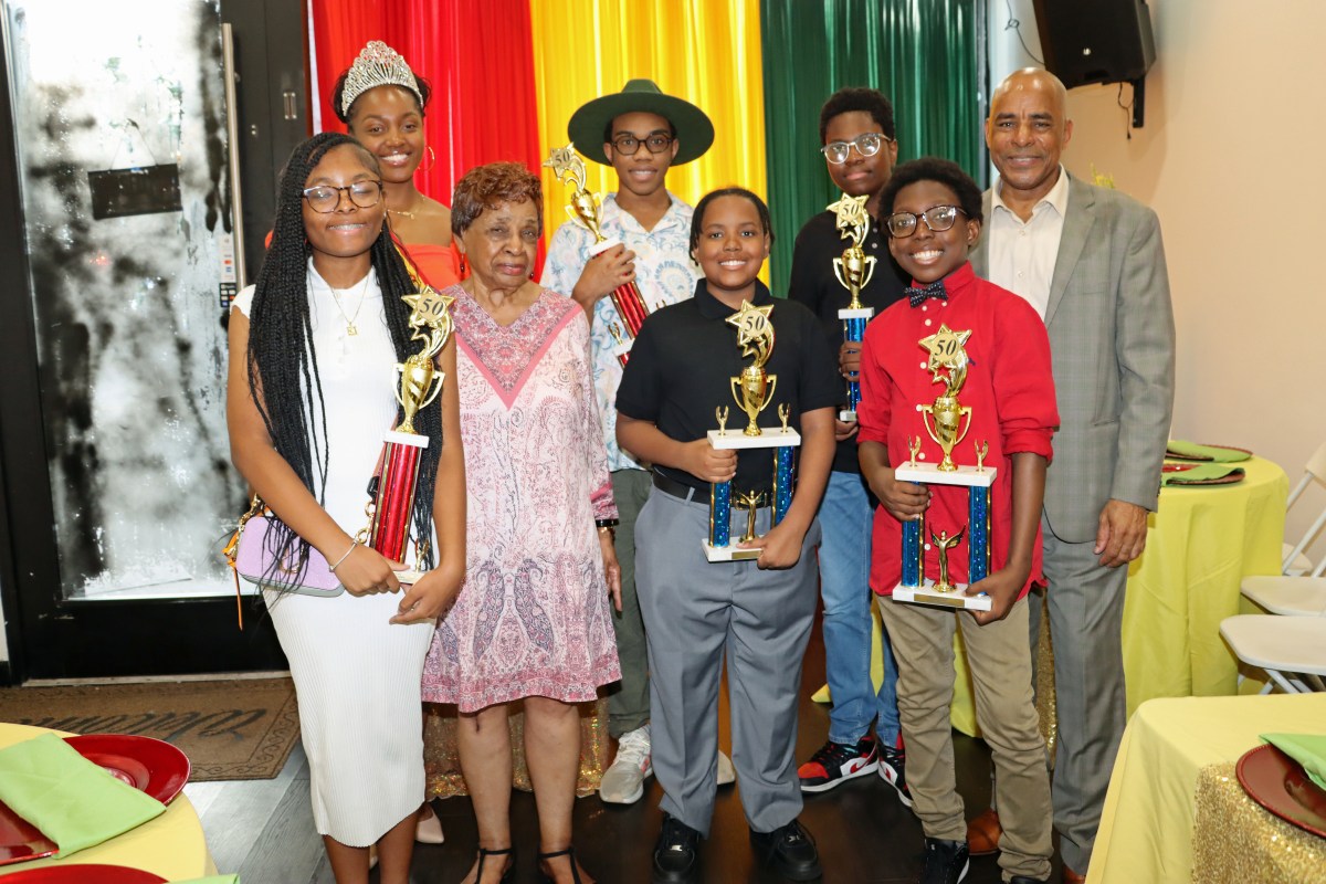 Awardees with Cecily Mason, second from left, and Consul General Raphael M. Brizan, back right.