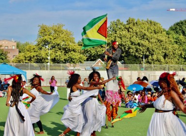 A spirited dance sequence entertains the audience at the Annual Guyana Folk Festival fun day to end the 2024 season at Old Boys and Girls High School in Crown Heights, Brooklyn.