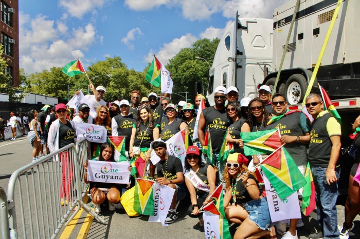 The One Guyana masqueraders in collaboration with NOMADS costume band leader Marlon Jacobs, on Eastern Parkway.