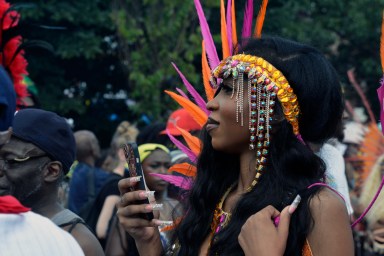 A masquerader on Eastern Parkway during the 2024 West Indian American Day Carnival.