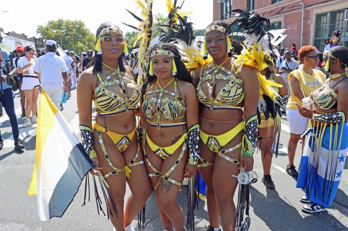 Representing the Garifuna Culture, from left, Jasmine Baltazar, Shivonnie Brown and Elizabeth Baltazar playing with Skymaxx Mas.