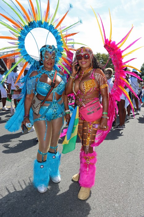 Celia Homer, left, and Arlene Pierre play with Sesame Flyers.