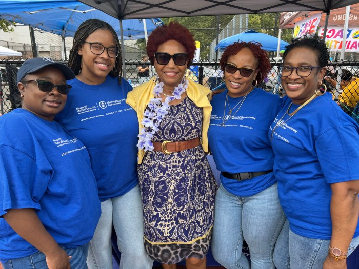 Council Member Mercedes Narcisse, center, with volunteers.