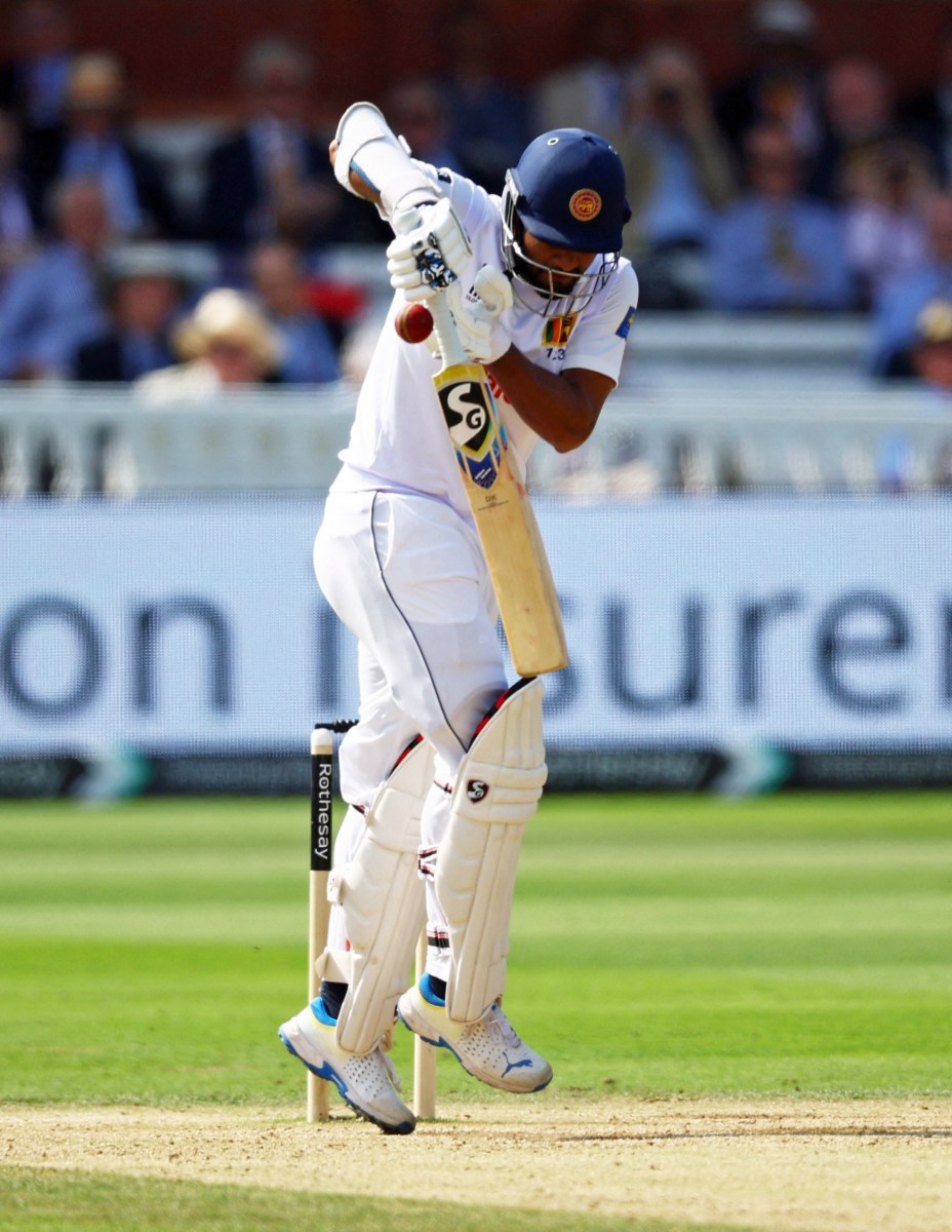 Sri Lanka's Dimuth Karunaratne in action before losing his wicket, caught out by England's Jamie Smith off the bowling of Olly Stone Action during the Second Test of England v Sri Lanka at Lord's Cricket Ground, London, Britain, Sept. 1, 2024. I