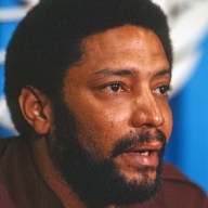 Close-up of Prime Minister of Grenada Maurice Bishop (1944 - 1983) during a press conference at the United Nations, New York, New York, late 1979.