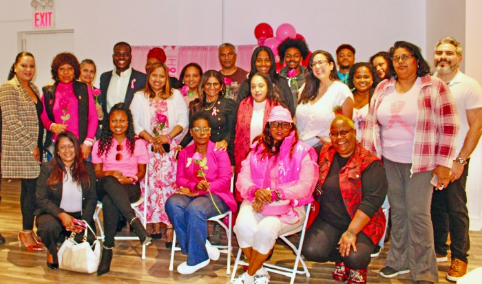 Several survivors, thrivers, and supporters joined Allison Alexis, third from left, sitting at her Seventh Annual Cancer Awareness candlelight vigil on Oct. 18 in Queens. Assembly Member Khaleel, fourth standing in the back row, was among the supporters.