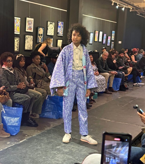 A young model confidently debuts a stunning Brooklyn-inspired design.