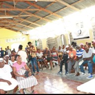 Residents of Les Cayes, Haiti, seeking medical care at a clinic organized by capracare.