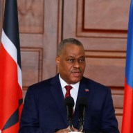 Haitian Prime Minister Garry Conille speaks during a joint press conference with Kenya's President William Ruto during his visit to the State House in Nairobi, Kenya, Oct.