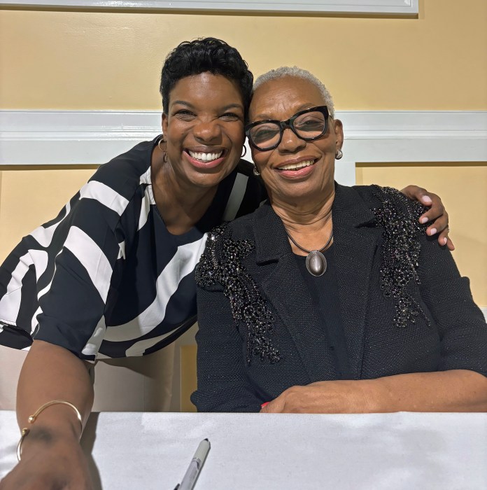 Dr. Royale-Davis poses with her daughter, Naala, during the book launch.