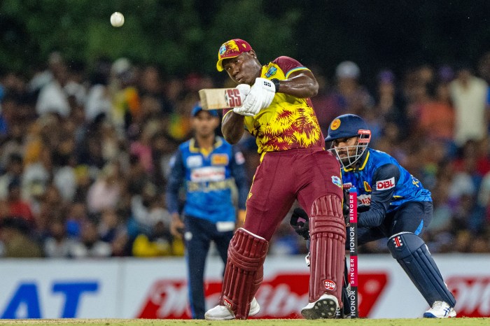 West Indies' captain Rovman Powell plays a shot during the third and final Twenty20 international cricket match between Sri Lanka and West Indies at the Rangiri Dambulla International Stadium in Dambulla on Oct. 17, 2024.