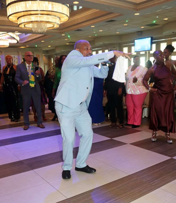 Calypsonian/soca artiste Dennis Bowman puts patrons in a party mood.