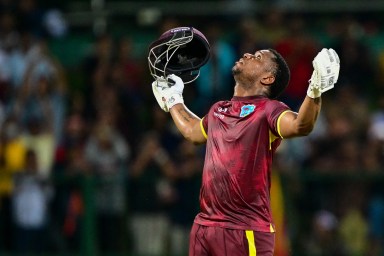 West Indies' Evin Lewis looks to the sky as he celebrates after West Indies won the third one-day international (ODI) cricket match between Sri Lanka and West Indies at the Pallekele International Cricket Stadium in Kandy on Oct. 26, 2024.