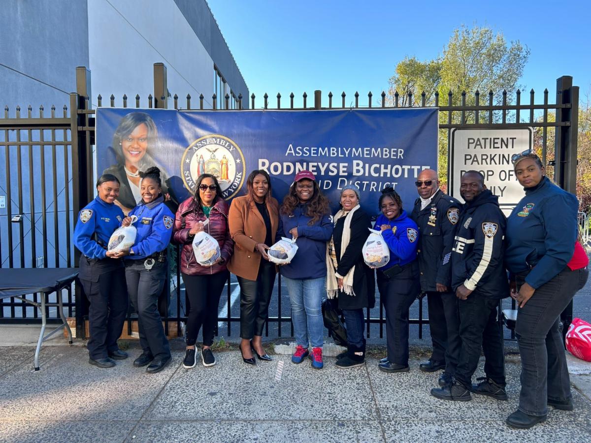 Volunteers, NYPD Officers from(70th Precinct, with, pictured center, Council Member Farah N. Louis, Assemblymember Rodneyse Bichotte Hermelyn, and her Chief of Staff Tyesha Allen.