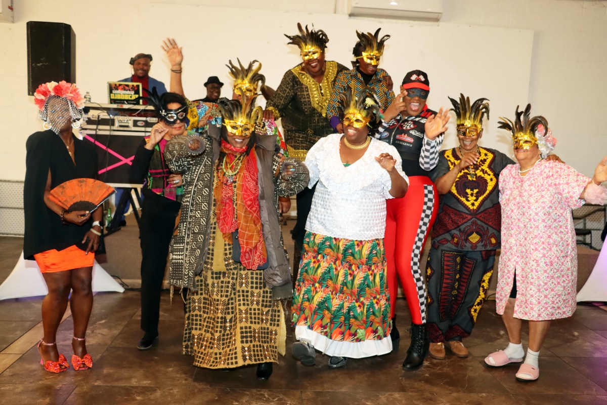 Brooklyn Canarsie Lions President Jean Joseph, third from left, front row, adorned in Dominican cultural outfit.