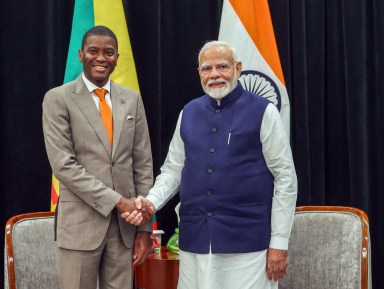 Prime Minister Narendra Modi meets Grenada Prime Minister Dickon Mitchell on the sidelines of the second India-CARICOM Summit, in Georgetown on Wednesday.