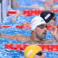 Dylan Carter of Team Trinidad and Tobago looks on after competing in the Men's 50m Butterfly Heat 5 on day ten of the Doha 2024 World Aquatics Championships at Aspire Dome on Feb. 11, 2024 in Doha, Qatar.