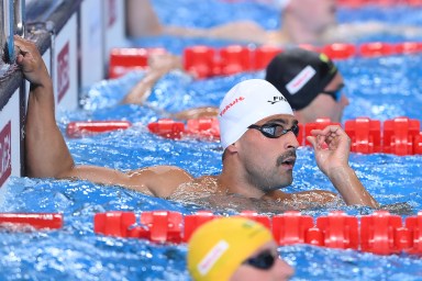 Dylan Carter of Team Trinidad and Tobago looks on after competing in the Men's 50m Butterfly Heat 5 on day ten of the Doha 2024 World Aquatics Championships at Aspire Dome on Feb. 11, 2024 in Doha, Qatar.