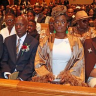 The Beaton Family in front pew: Husband Douglas Beaton, second from left, with daughter Denica to his immediate left.