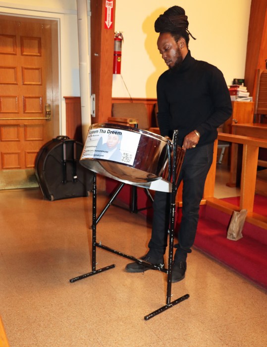 Kareem Thompson plays "Amazing Grace" on a steel pan.