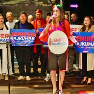 Candidate for NYC Comptroller Jenifer Rajkumar addressing supporters, some holding placards, during a kickoff campaign on Nov. 21 at the Palace in Woodside.