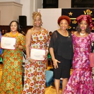 A group of beautifully dressed women were honored at the 11th Annual Noni Styles runway event on Oct. 12 at the Major Owens Center in Brooklyn. From left are Kamla Millwood, Paula Harris, and Karla Jo-Ann Gittens. NYC Council Member Mercedes Narcisse, fourth from left, joins Venice Anderson and Violinist Dr. Melanie R. Hill for the photo-op.