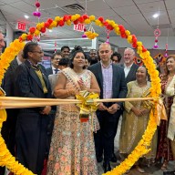 Susan Almodovar, owner of Unicare Adult Daycare, joins family, friends, and community leaders for the ribbon-cutting ceremony celebrating the opening of her new South Richmond Hill location.