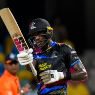 Justin Greaves of Antigua and Barbuda Falcons celebrates his half century during the Men's 2024 Republic Bank Caribbean Premier League match 13 between Barbados Royals and Antigua and Barbuda Falcons at Kensington Oval on Sept. 11, 2024 in Bridgetown, Barbados.