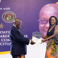 Jamaican Canadian Keondra Tomlinson-Gayle, right, is being presented with her certificate of Ghanaian citizenship by President President Akufo-Addo after being sworn in among more than 200 Afro-Caribbean citizens at a ceremony on Nov. 19, 2024, in Accra, Ghana.