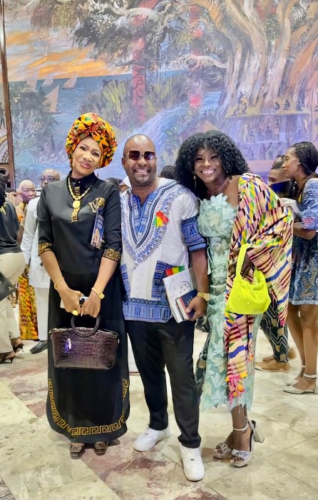 American Marvin Walker, center, with fellow new Ghanaian centers after being sworn in among more than 200 Afro-Caribbean citizens at a ceremony on Nov. 19, in Accra, Ghana.