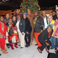 Brooklyn Canarsie Lions gather in front of the Christmas tree.