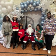 Assembly Member Monique Chandler-Waterman, second from left, with Santa and staffers.