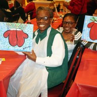 Trinidadian Marlene Ferguson, in the foreground, and Grenadian Natalie Wilson, display their finished product.