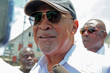 Suriname former President Desi Bouterse leaves the High Court of Justice for his appeal case against the Court Martial sentence of 20-year jail for his involvement in the murder of 15 people when he ruled in 1982 during his military government, in Paramaribo on March 31, 2023.