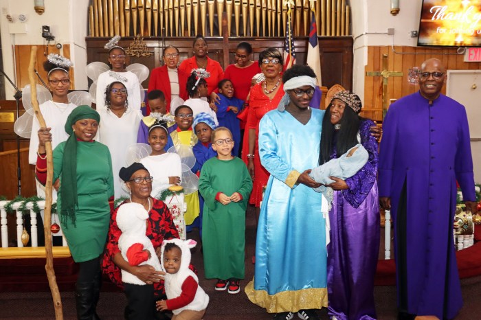 Pastor the Rev. Roger Jackson, who portrays "King Herod" with Mary and Joseph, second and third from right, with Baby Jesus, and the cast of the pageant, "Good Keeps His Promise."