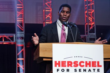 Georgia Republican Senate candidate Herschel Walker delivers his concession speech during an election night event at the College Football Hall of Fame on Dec. 6, 2022 in Atlanta, Georgia.